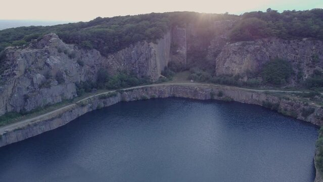 Drone View Of Opal Søen A Lake With Cliffs During Sunset At Bornholm Denmark