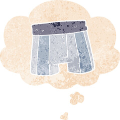 cartoon boxer shorts and thought bubble in retro textured style