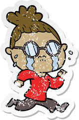 distressed sticker of a cartoon crying woman wearing spectacles