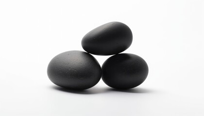 Fototapeta na wymiar isolated black zen stones stacked on white background