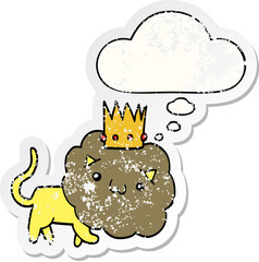 cartoon lion with crown and thought bubble as a distressed worn sticker