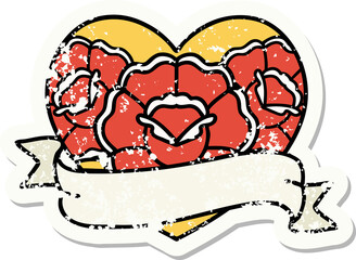 traditional distressed sticker tattoo of a heart and banner with flowers