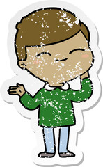 distressed sticker of a cartoon shy smiling boy