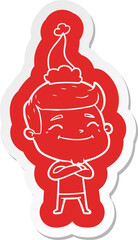 happy cartoon  sticker of a man wearing santa hat