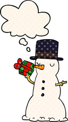 cartoon snowman and thought bubble in comic book style