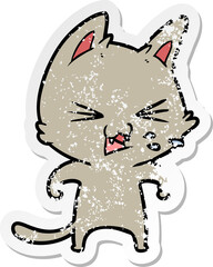 distressed sticker of a cartoon cat hissing