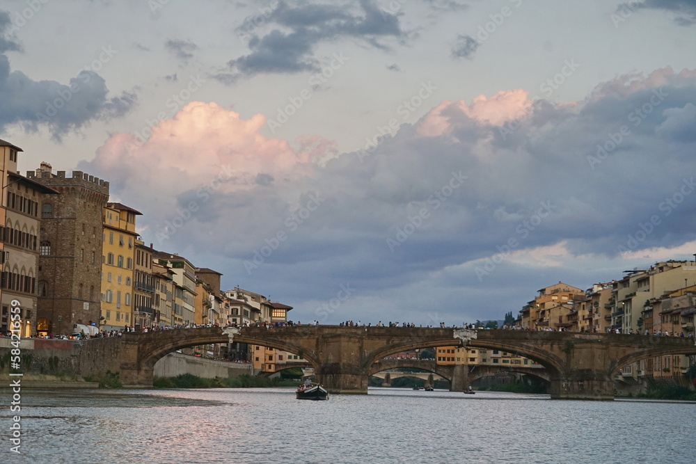 Wall mural santa trinita bridge seen from a boat on the arno river in florence, tuscany, italy