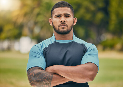 Rugby, field and portrait of confident man with serious expression, confidence and pride in winning game. Fitness, sports and proud face of player at match, workout or competition on grass at stadium