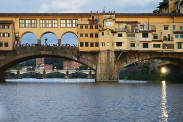 Detail of Ponte Vecchio seen from a boat on the Arno River in Florence, Tuscany, Italy