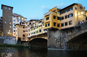 Fototapeta na wymiar Detail of Ponte Vecchio seen from a boat on the Arno River in Florence, Tuscany, Italy