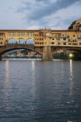 Obraz premium Detail of Ponte Vecchio seen from a boat on the Arno River in Florence, Tuscany, Italy
