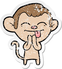 distressed sticker of a funny cartoon monkey