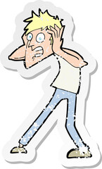 Fototapeta premium retro distressed sticker of a cartoon man panicking