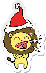sticker cartoon of a roaring lion wearing santa hat