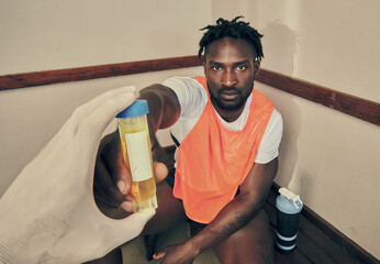 Sports, doctor and a portrait of a black man with a pee test to check for cheating or drug use. Analysis, giving and an African sport player with a urine sample for testing during fitness practice - obrazy, fototapety, plakaty