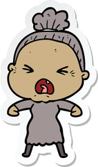 sticker of a cartoon angry old woman