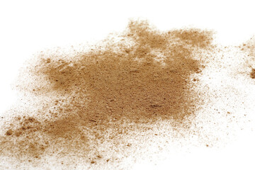 Pile of brown dust scattered on white background