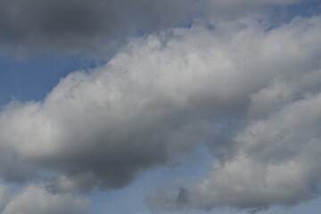 Naklejka na ściany i meble Clouds in the sky looking dramatic