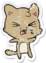 distressed sticker of a cartoon hissing cat