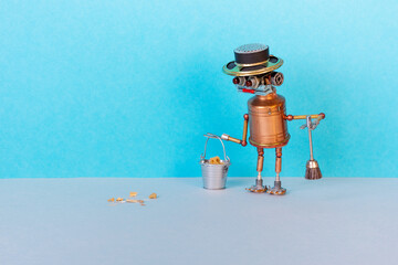Robot sweeper cleaner with a bucket sponge, brush for garbage looks at the scattered garbage. The...