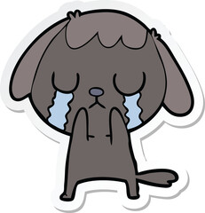 sticker of a cute cartoon dog crying