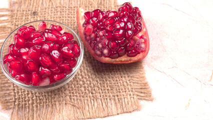 Fresh Pomegranate rich in natural antioxidants. Concept of red fruits, vitamins and natural antioxidants to the skin for beauty.
