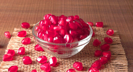 Fresh Pomegranate rich in natural antioxidants. Concept of red fruits, vitamins and natural antioxidants to the skin for beauty.
