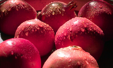 Fresh Pomegranate rich in natural antioxidants. Concept of red fruits, vitamins and natural antioxidants to the skin for beauty.
