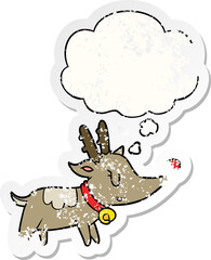 cartoon christmas reindeer and thought bubble as a distressed worn sticker