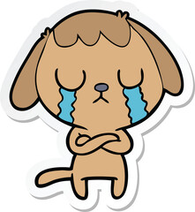 sticker of a cute cartoon dog crying