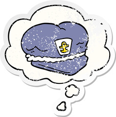 cartoon sailor hat and thought bubble as a distressed worn sticker