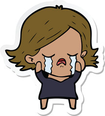 sticker of a cartoon girl crying