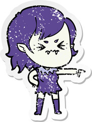 distressed sticker of a annoyed cartoon vampire girl