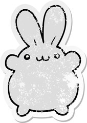 distressed sticker of a cartoon rabbit