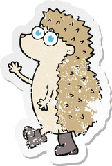 retro distressed sticker of a cute cartoon hedgehog