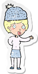 retro distressed sticker of a cartoon woman wearing winter hat