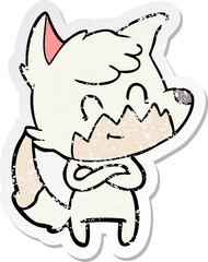 distressed sticker of a cartoon friendly fox