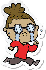 sticker of a cartoon crying woman wearing spectacles