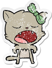 distressed sticker of a cartoon cat meowing