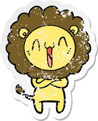 distressed sticker of a happy cartoon lion