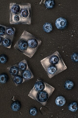 close up of a blueberries in ice cube
