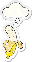 cartoon banana and thought bubble as a distressed worn sticker