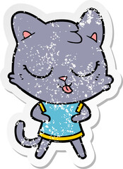 distressed sticker of a cartoon cat