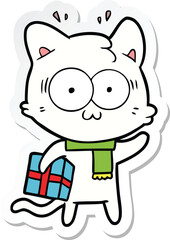 sticker of a cartoon surprised cat with christmas present