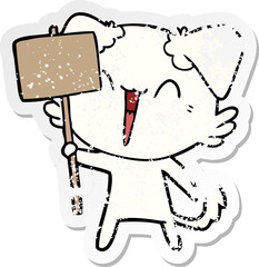 distressed sticker of a happy little cartoon dog holding sign