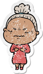 distressed sticker of a cartoon annoyed old lady