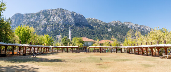 Naklejka premium Empty Market square in Ormana village, Turkey. With warm, cozy atmosphere and friendly residents make visitors feel welcome and at home