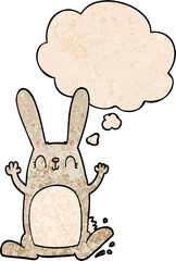 cartoon rabbit and thought bubble in grunge texture pattern style