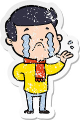 distressed sticker of a cartoon man crying