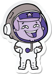 Obraz premium sticker of a cartoon laughing astronaut